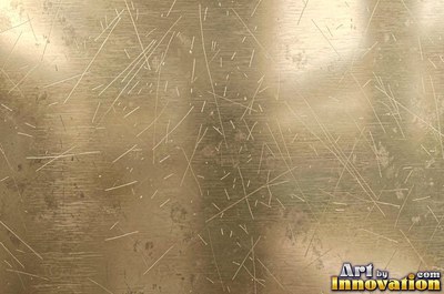 Cross hatched brushed metal with two sets of fine lines in pewter