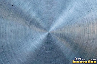 Cross hatched brushed metal with two sets of fine lines in pewter