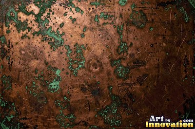 Hammered rose copper with dark recesses and bright high points