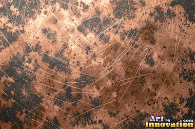 Copper roof panel with drips of patina running down it
