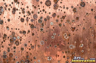 Hammered rose copper with dark recesses and bright high points