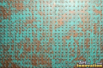 Copper roof panel with drips of patina running down it