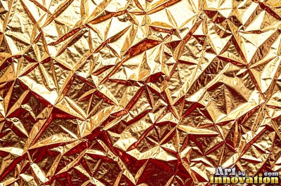 Crinkled gold leaf laid in overlapping squares with fine seams