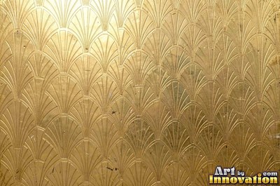 Brushed gold with a straight fine grain and a warm sheen