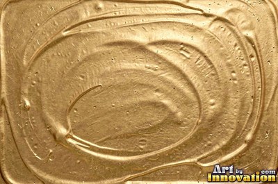 Honey gold engraved with a scroll pattern across the whole frame