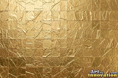 Crinkled gold leaf laid in overlapping squares with fine seams