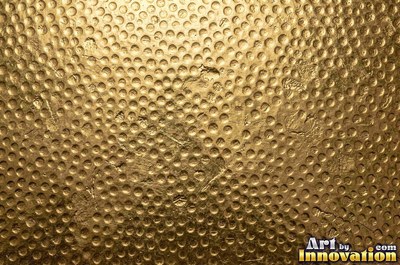 Brushed gold with a straight fine grain and a warm sheen