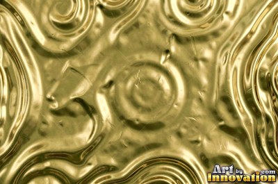 Brushed gold with a straight fine grain and a warm sheen