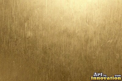 Brushed gold with a straight fine grain and a warm sheen