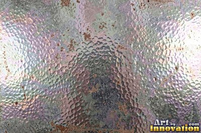 Stainless hammered metal tiles with a raised rim around each square