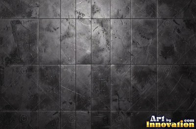 Large shallow hammer marks catching light like ripples on water