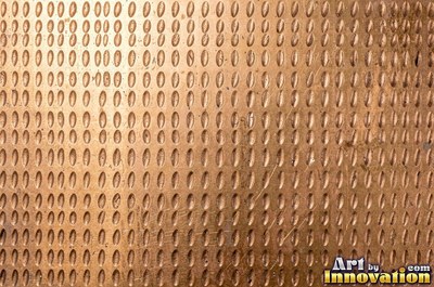 Stainless hammered metal tiles with a raised rim around each square