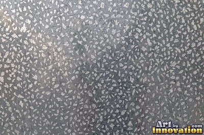 Industrial metal with chipped hazard stripes worn back to bare metal