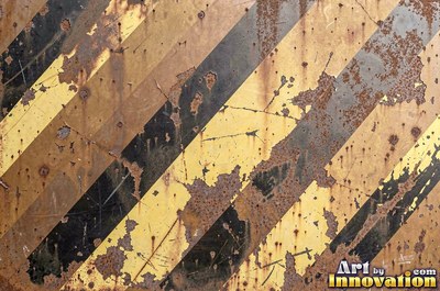 Welded steel surface with weld beads and grinding marks