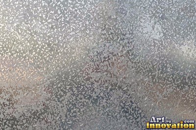 Welded steel surface with weld beads and grinding marks