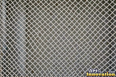 Welded steel surface with weld beads and grinding marks