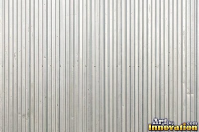 Industrial metal with chipped hazard stripes worn back to bare metal