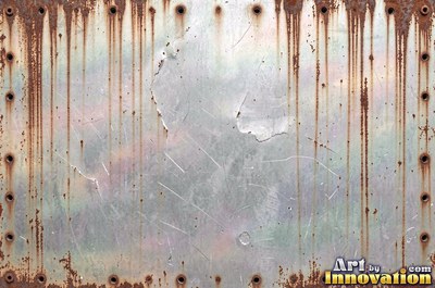 Rust bubbling up under old paint with blisters bursting open