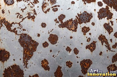 Heavily rusted steel plate with flaking orange scale and dark pits