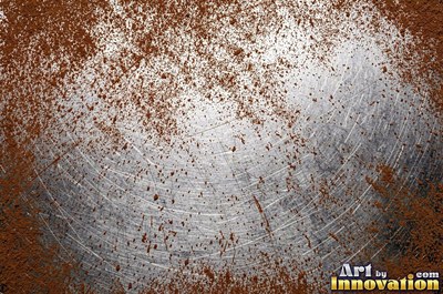 Corroded iron with streaks of rust running down from bolt holes