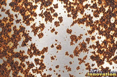 Rust bubbling up under old paint with blisters bursting open