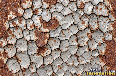 Heavily rusted steel plate with flaking orange scale and dark pits