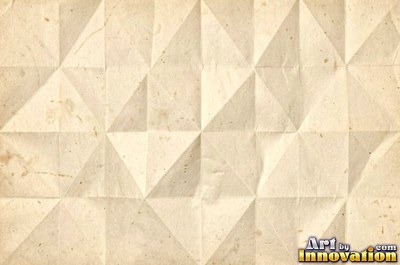 Crumpled paper smoothed out with a web of sharp creases in aged ivory