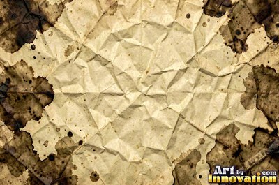 Folded paper in a regular geometric crease pattern