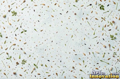Lavender paper with embedded seeds and plant flecks