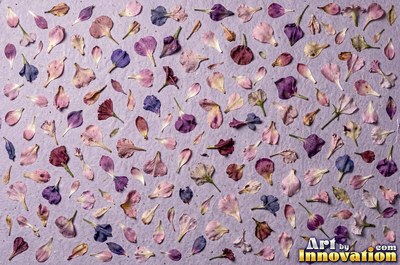 Lavender paper with embedded seeds and plant flecks