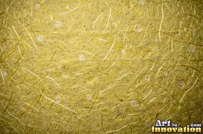 Rough cotton rag paper with a soft texture in coffee stained tan