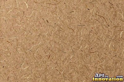 Rough cotton rag paper with a soft texture in coffee stained tan