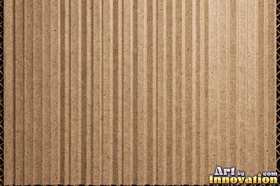 Torn kraft brown cardboard revealing the corrugation underneath