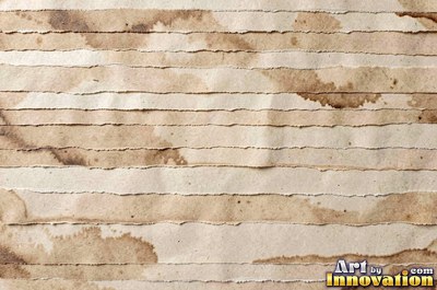 Torn kraft brown cardboard revealing the corrugation underneath