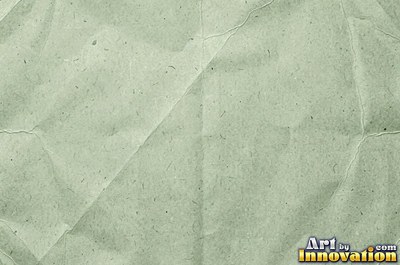 Torn kraft brown cardboard revealing the corrugation underneath