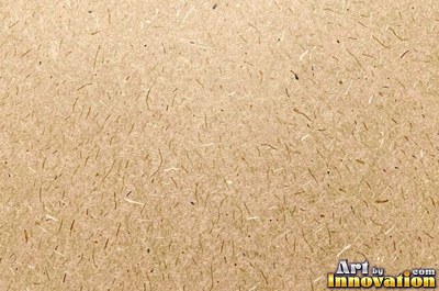Crushed charcoal black cardboard with dents and folds