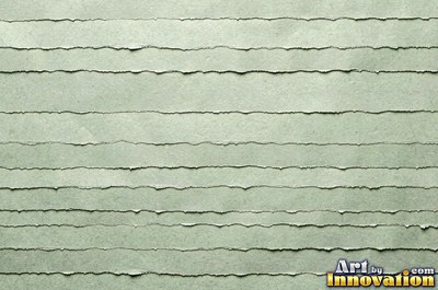 Crushed charcoal black cardboard with dents and folds