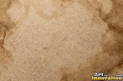 Torn kraft brown cardboard revealing the corrugation underneath