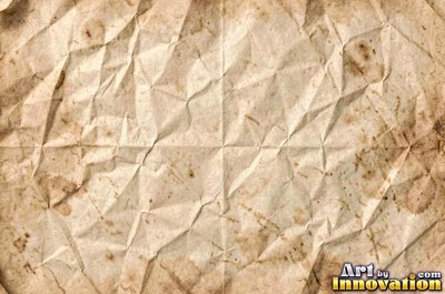 Oatmeal speckled old paper marked with water stains