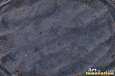 Aged parchment with mottled stains and darker edges