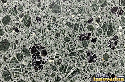 Blue gray granite with thin pale quartz veins cutting across it