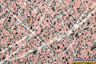 Green gray polished granite with a few large dark crystal clusters
