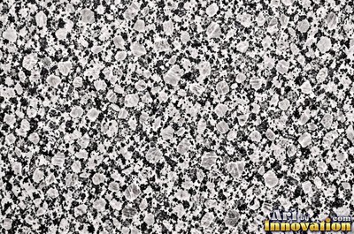 Cream granite with flecks of mica glinting in the light