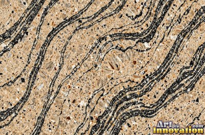 Green gray polished granite with a few large dark crystal clusters
