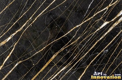 Polished white marble with a few thin gold-like veins