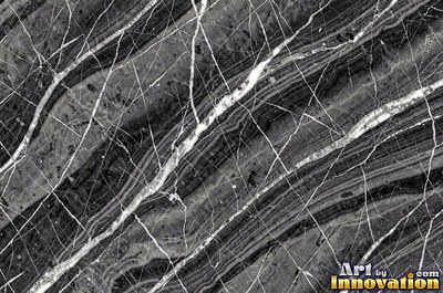 Bold dramatic marble veining in thick sweeping bands of ivory and gold