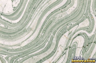 Tumbled slate blue marble with soft worn edges and faded veins
