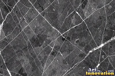 Bold dramatic marble veining in thick sweeping bands of ivory and gold