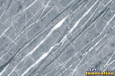 Tumbled slate blue marble with soft worn edges and faded veins