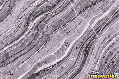 Tumbled slate blue marble with soft worn edges and faded veins